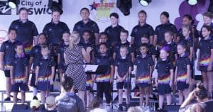 School choir on stage at the Goodna Jacaranda Festival